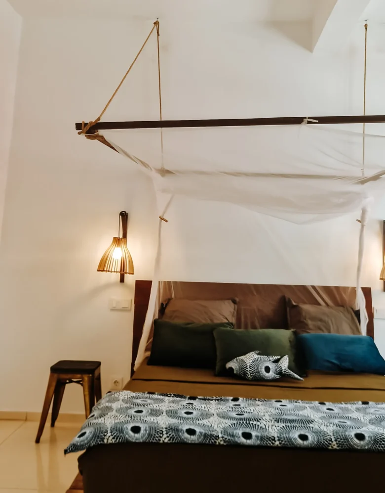 Boa Vista Deluxe Suite: double bed with mosquito net